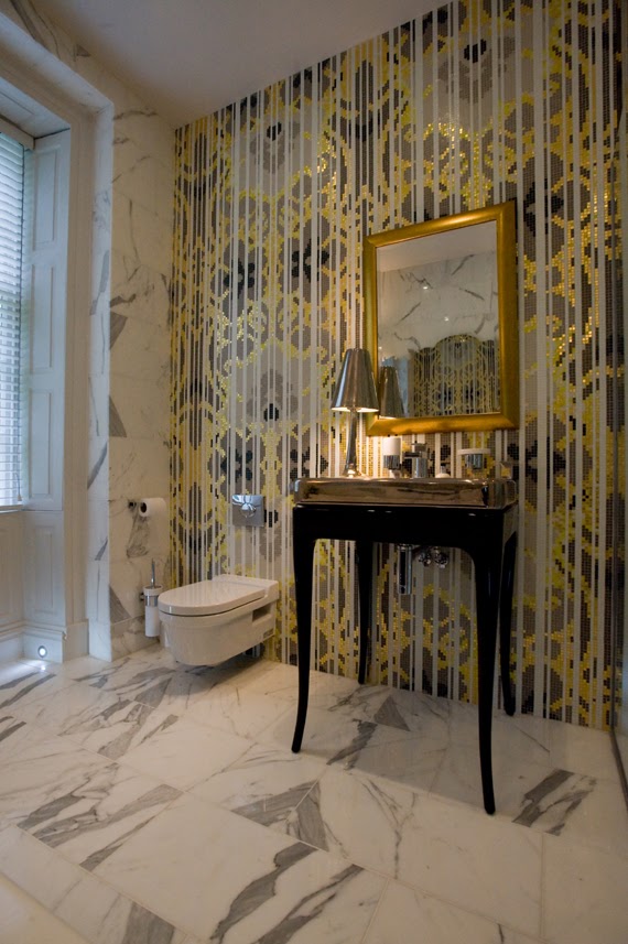 elegant gold black and white mosaic bathroom