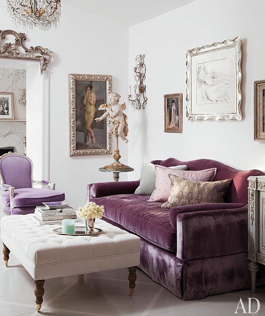 purple small living room with velvet sofa