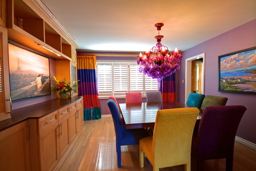 Colorful Dining Room with Multicolored Chairs 11
