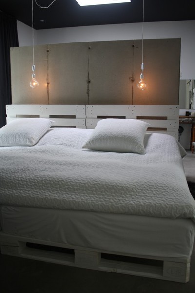 white bed made by pallets