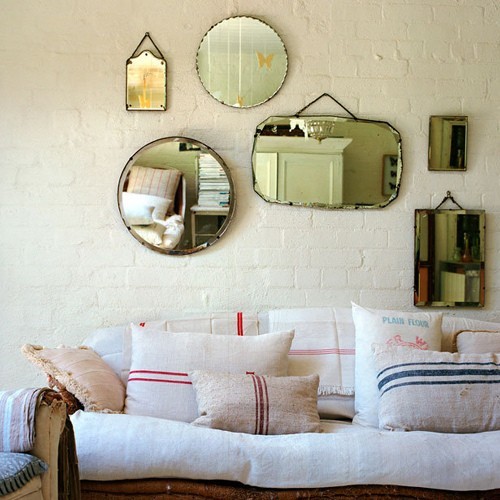 many_small_mirrors_on_the wall