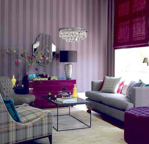 living room with purple console and stripe wallpaper