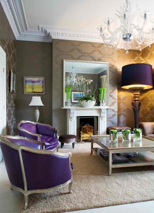living room design with gold wallpaper purple armchairs and floor lighting