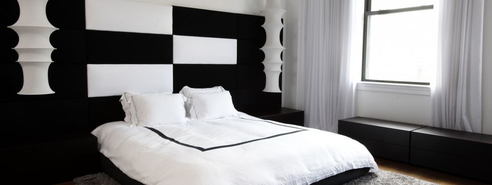 modern black and white bedroom by holzman interiors