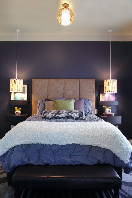purple bedroom with hanging lights