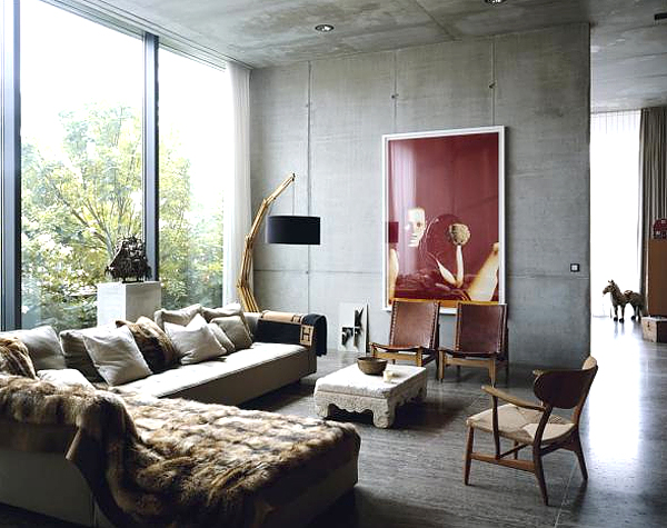 concrete living room with modern photo wall decor