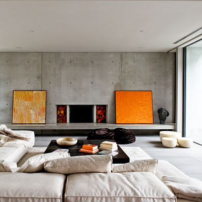 concrete living room and fireplace
