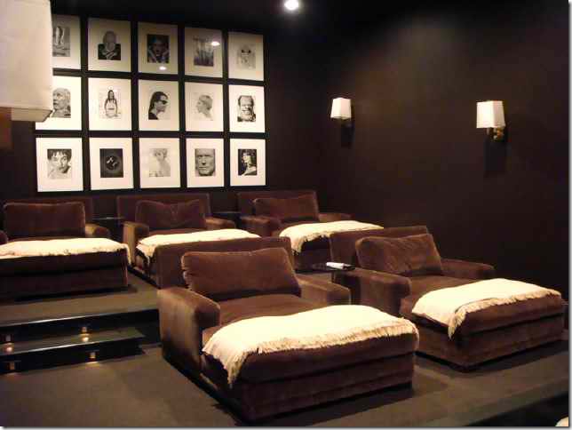 home theater room with brown velvet armchairs