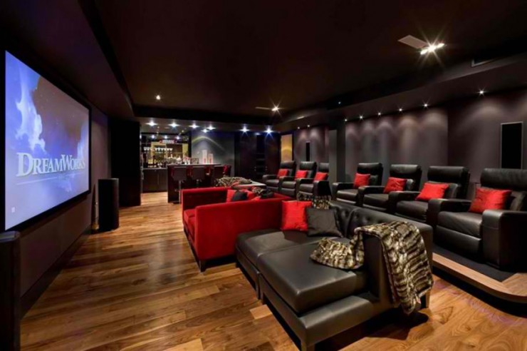 home theater with black leather armchairs