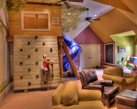 kid's playroom with climbing wall and slide