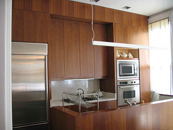modern  wood small kitchen with high cabinets