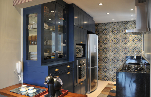 deep blue cabinets and vintage tiles