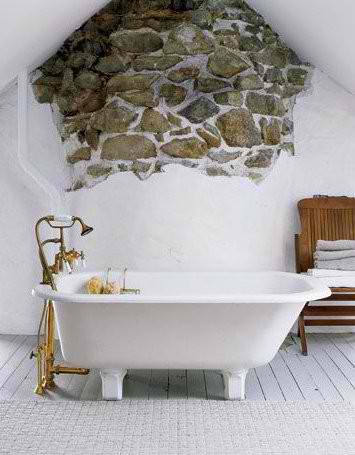 bathroom design with exposed stone
