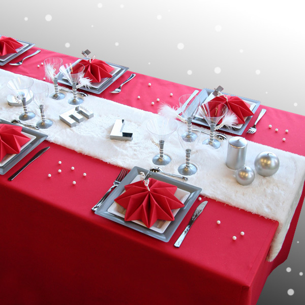 festive table with red and white decorations