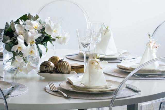 white and golden elements on table decorations