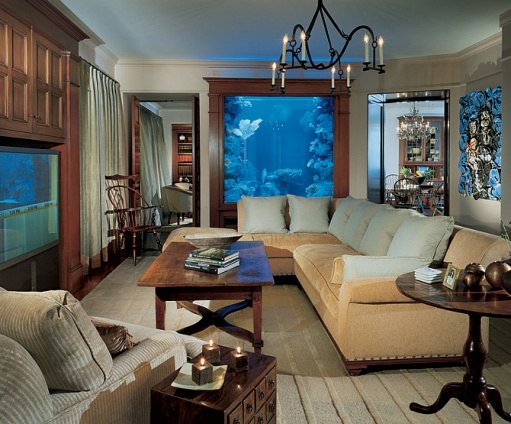 living room with eight foot tall saltwater aquarium