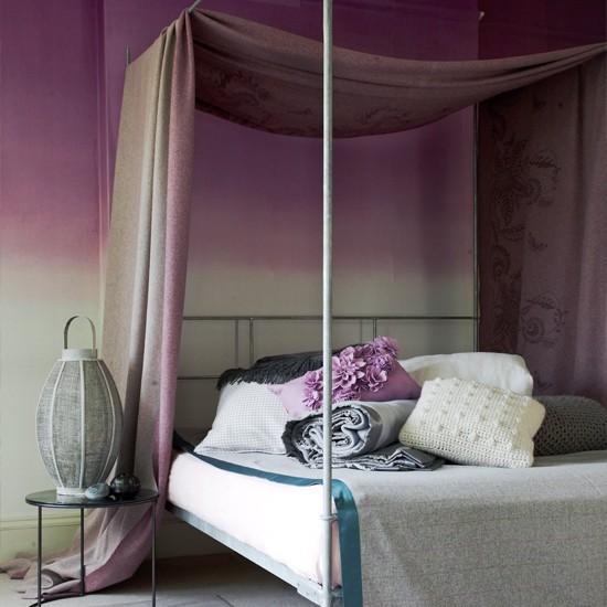 Give your bedroom a glamorous look by draping luxurious fabric over a ...