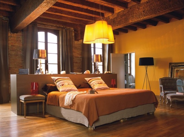 warm bedroom with brick walls
