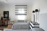 bedroom with blue and white tiles by cadena