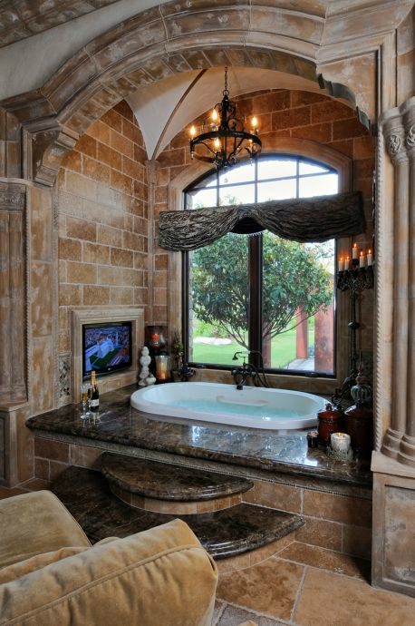 unique bathroom with tv and view