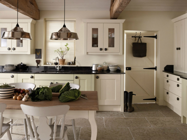 white country kitchen with black countertop