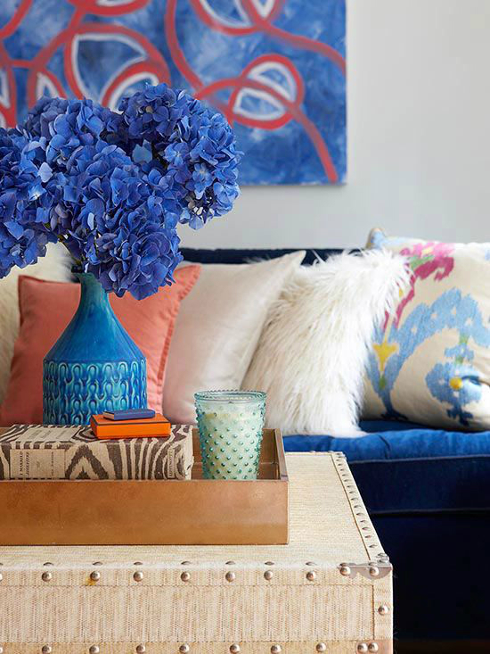 living room with blue indigo painting and flower