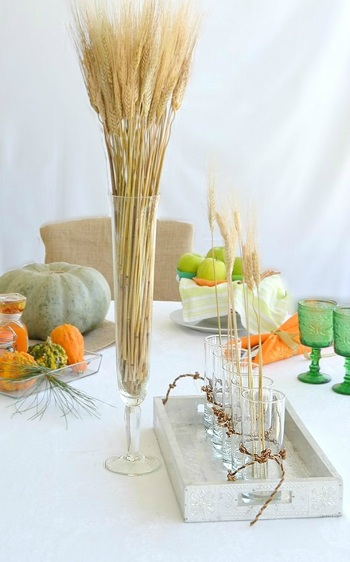 thanksgiving dtable decoration with wheat and glasses with twine