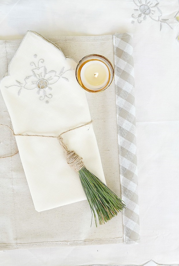 country rustic diy napkin ring tassel by pine needles