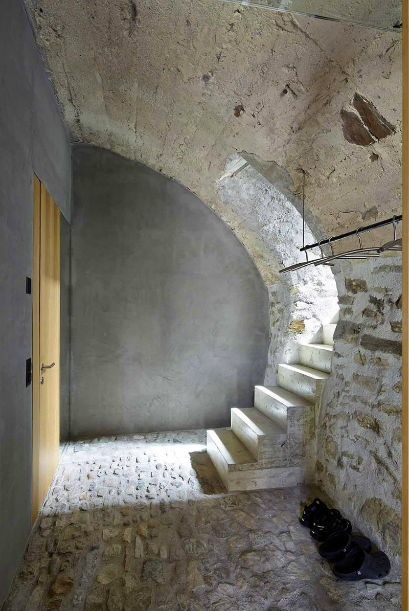 cave house contemporary stone interior stairs
