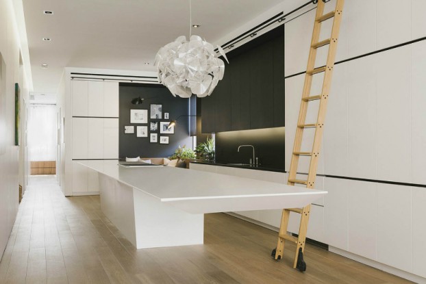 minmal black white kitchen with ladder and large lighting