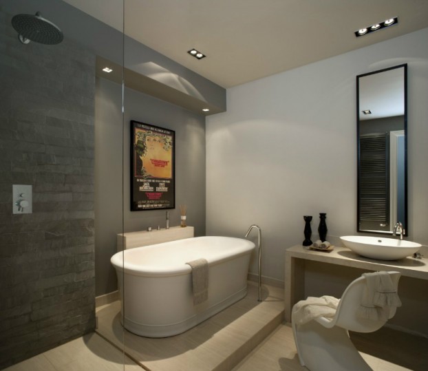 italian gray bathroom with freestanding tub