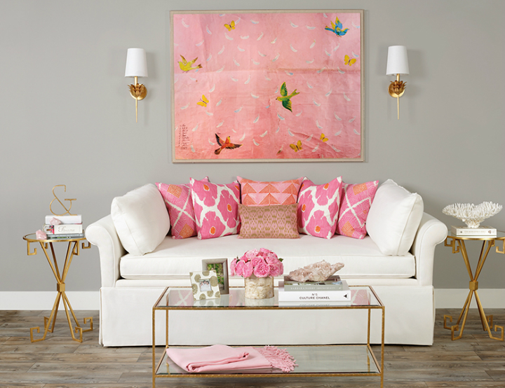 high fashion home gray wall living room idea with pink art and pillows