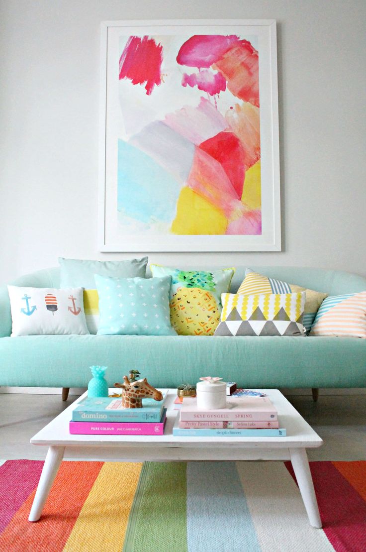 colorful living room with oversized statement art piece 