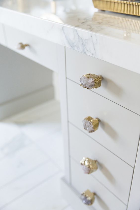 Cabinet knobs are the Crowned Quartz Knob by Anthropologie