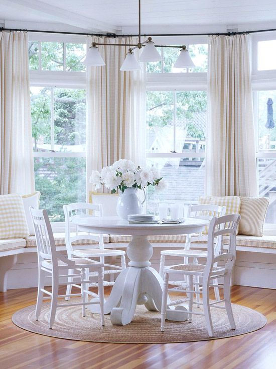 elegant breakfast nook with bay windows