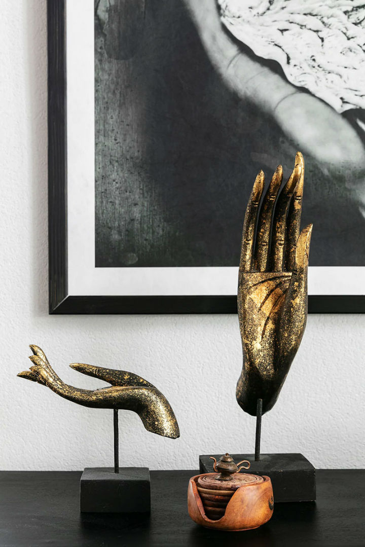 gold decorative hands sculptures