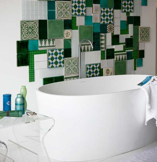 green and white mosaic bathroom