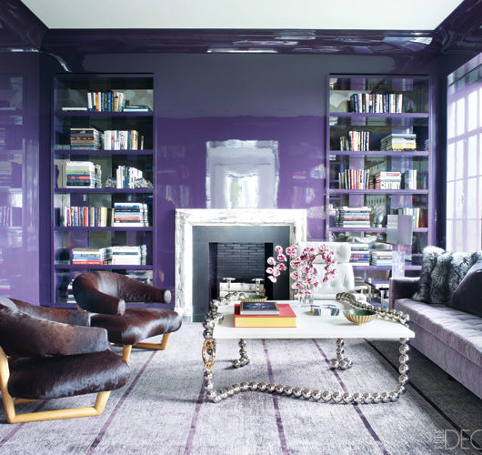 purple contemporary living room with silver coffee table