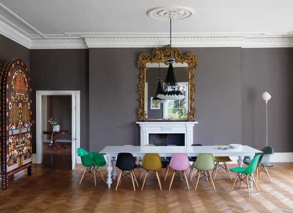 Colorful Dining Room with Multicolored Chairs 