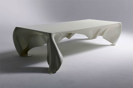 Floating white ghost table by Graft Architects