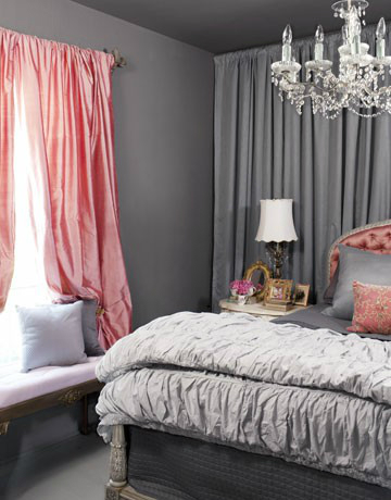 gray bedroom with pink curtains