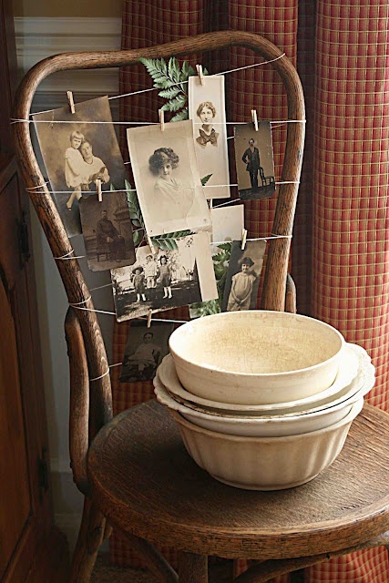 wood chair with old pictures on it