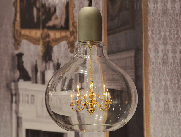 chandelier suspended inside a glass lightbulb 3