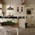 white country kitchen with black countertop