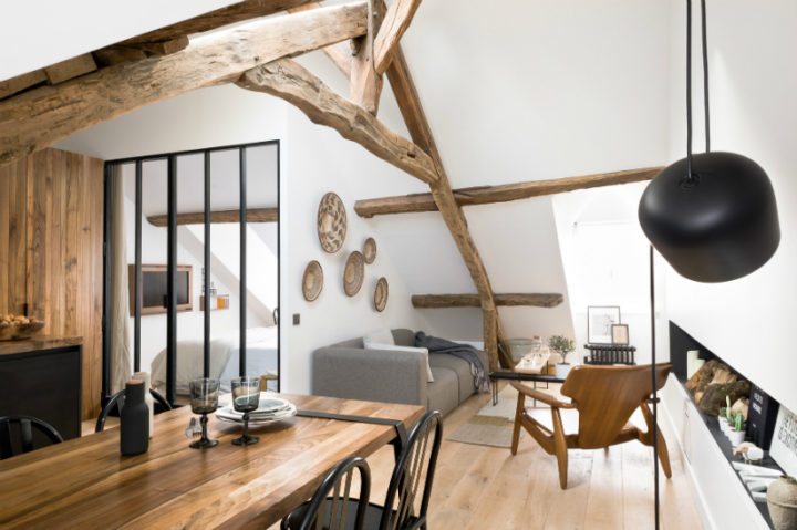 white walls with rustic wood beams