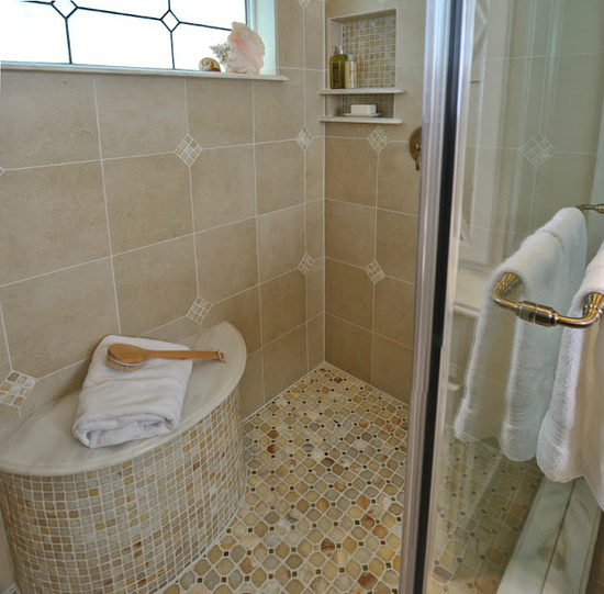 beige tiles in the shower unit