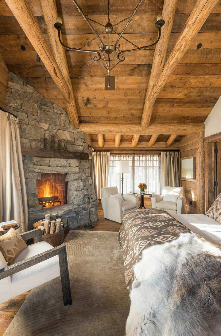 stone fireplace in bedroom