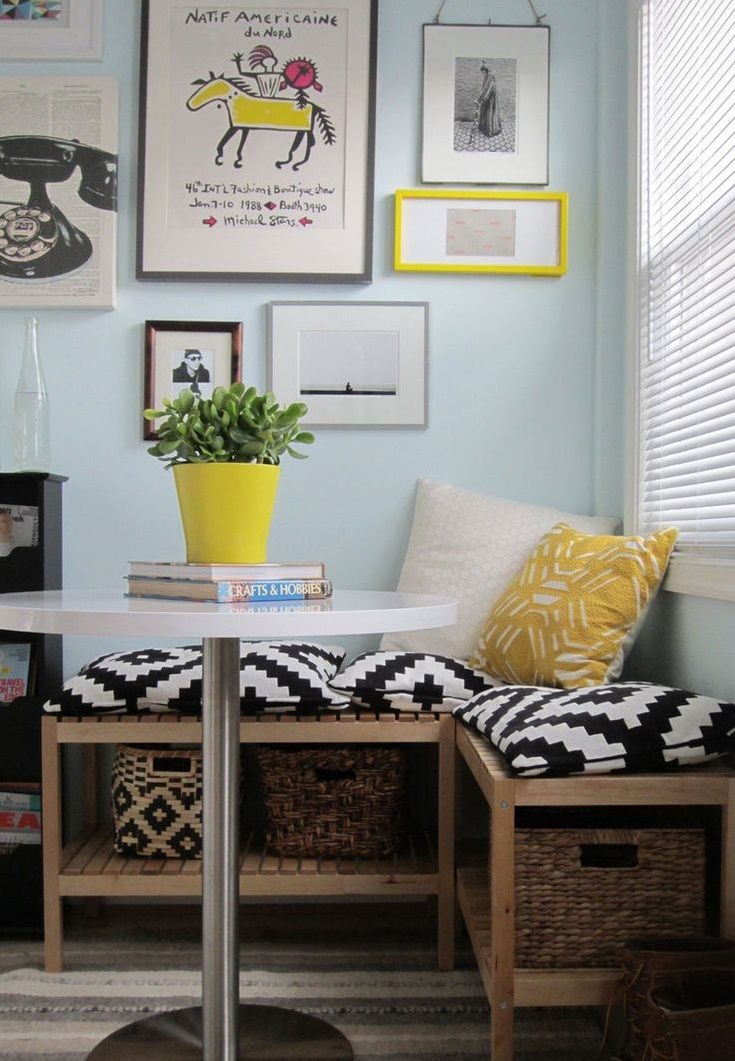 patterned pillows and frames on the wall