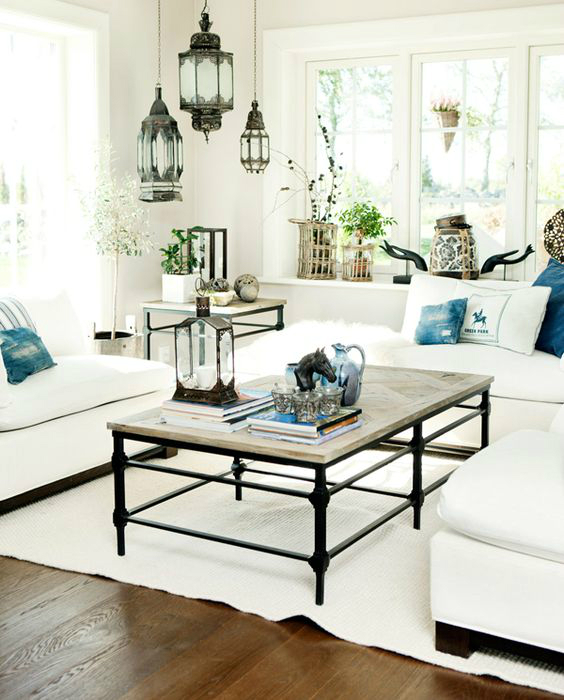 new england style living room with handmade artisan lighting