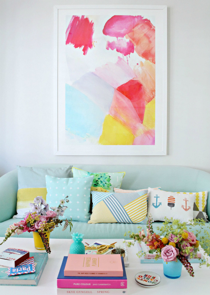 bright vases, citrus colors, spunky pillow patterns living room